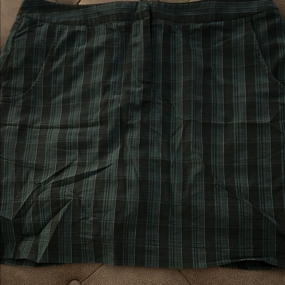 Cutter & Buck Dark Plaid golf skort with two pockets in front one in back